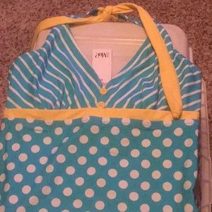 Striped and polka dotted one piece halter top swimsuit.